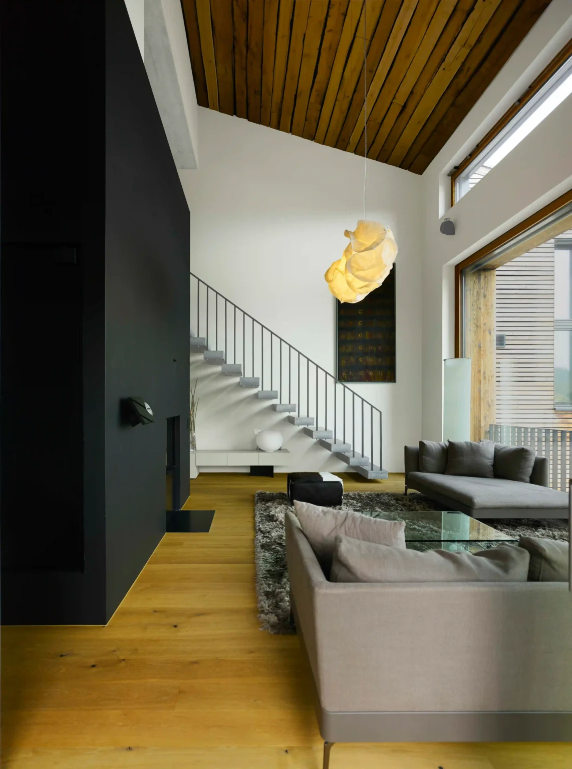 Doppelwohnhaus Luchsinger Pedersen Flims Dorf Wohnzimmer mit Sofa